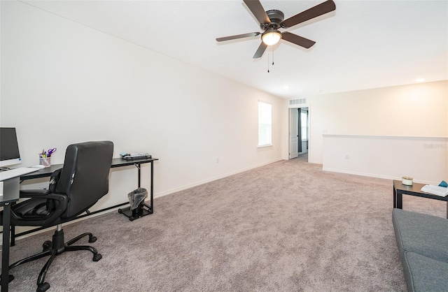 home office with light colored carpet and ceiling fan