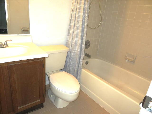 full bathroom with vanity, toilet, tile patterned flooring, and shower / bath combo