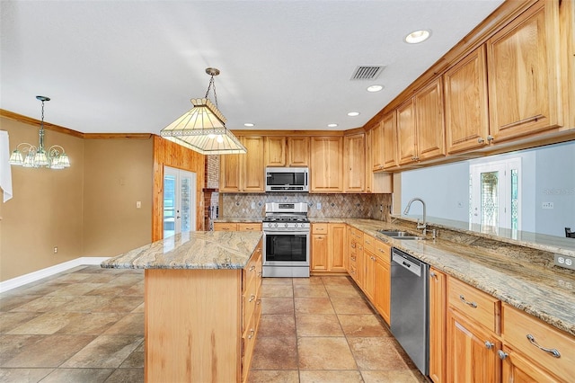 4147 Boggy Creek Rd, Kissimmee, FL 34744 - kitchen featuring appliances with stainless steel finishes, a sink, baseboards, backsplash, and a chandelier