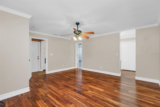 spare room with crown molding, a textured ceiling, ceiling fan, and dark hardwood / wood-style floors