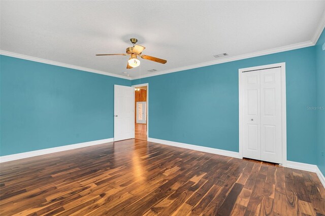 4147 Boggy Creek Rd, Kissimmee, FL 34744 - spare room with wood finished floors, ceiling fan, baseboards, and ornamental molding