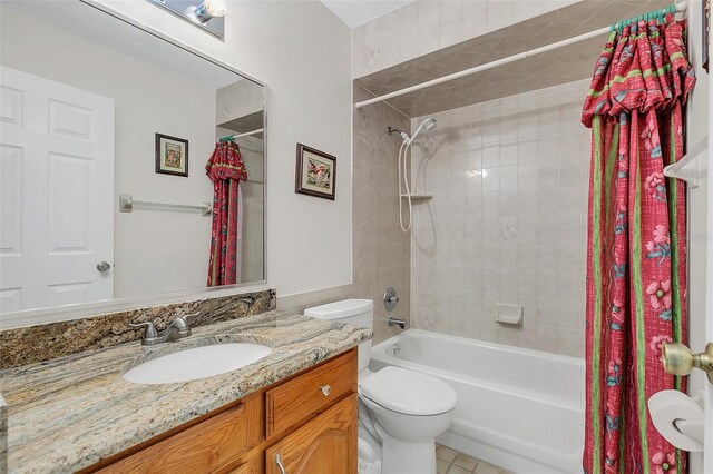 4147 Boggy Creek Rd, Kissimmee, FL 34744 - bathroom featuring shower / bath combo, vanity, and toilet