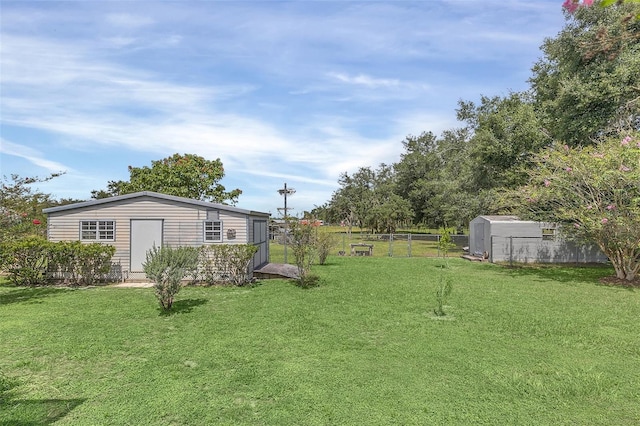 view of yard with a storage unit