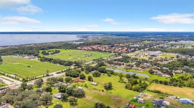 4147 Boggy Creek Rd, Kissimmee, FL 34744 - drone / aerial view of a large body of water