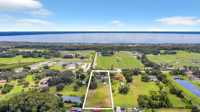 4147 Boggy Creek Rd, Kissimmee, FL 34744 - view of property location with a nearby body of water and property boundaries highlighted