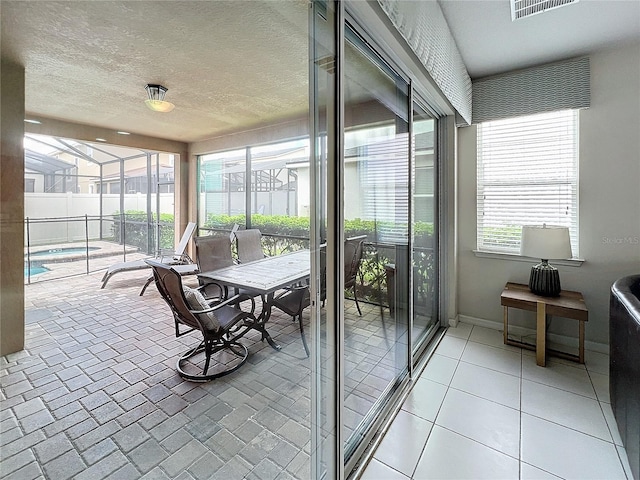 sunroom / solarium with visible vents