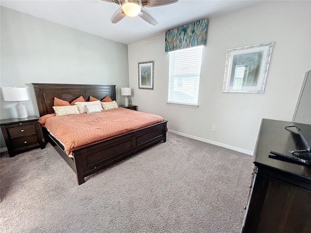 bedroom with baseboards, light carpet, and ceiling fan