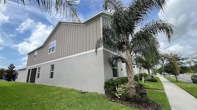 view of home's exterior featuring a yard