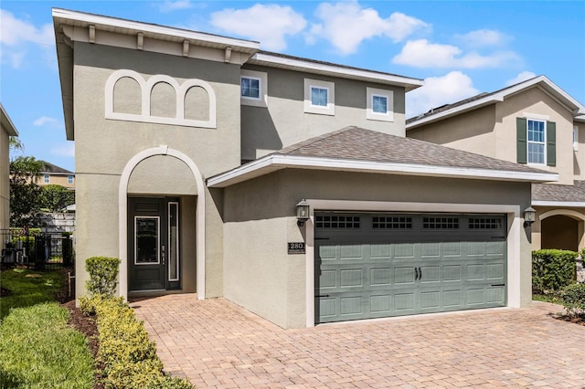 view of front of home with a garage