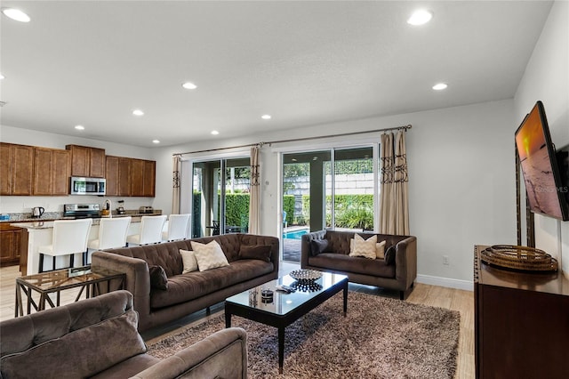 living room featuring light wood-type flooring