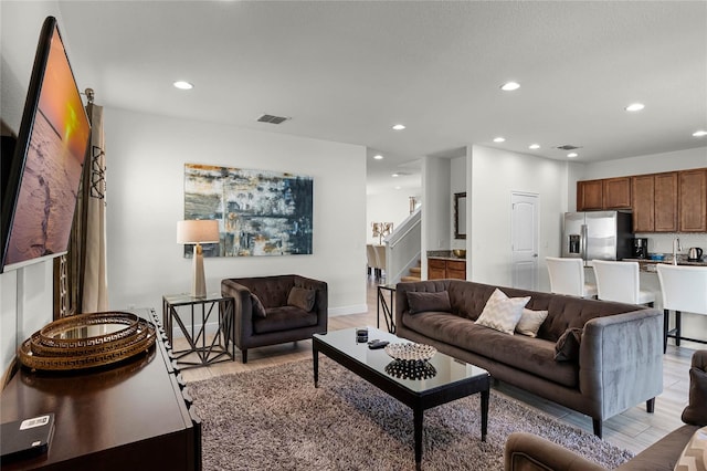 living room featuring light wood-type flooring