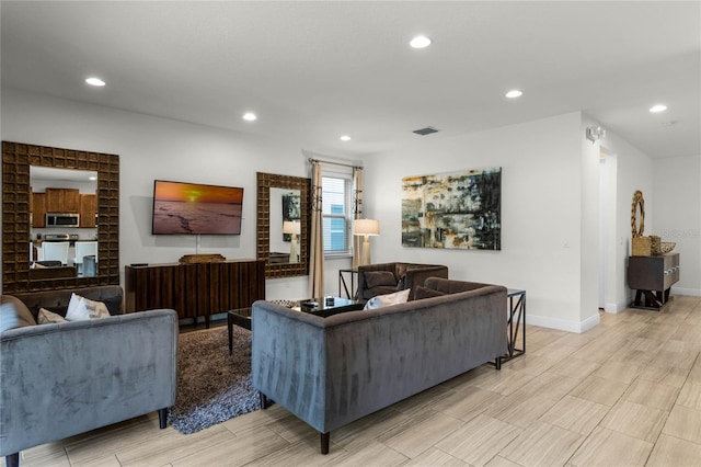 living room featuring light wood-type flooring