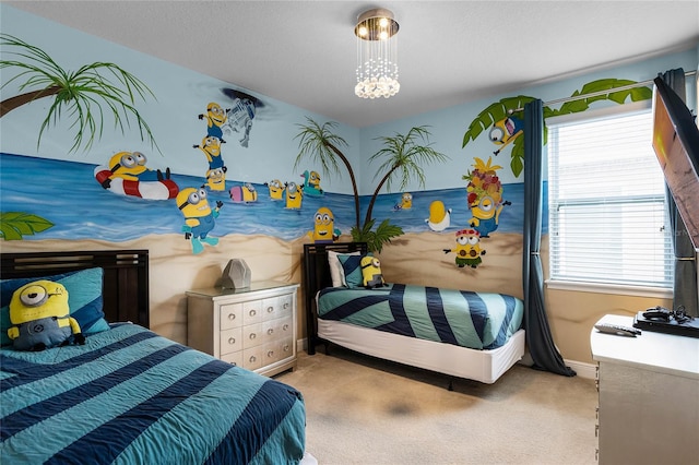 bedroom featuring a notable chandelier and light carpet