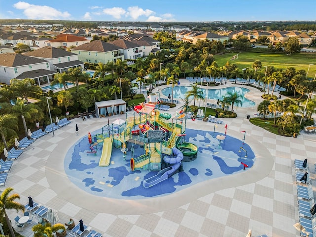 view of pool featuring a playground