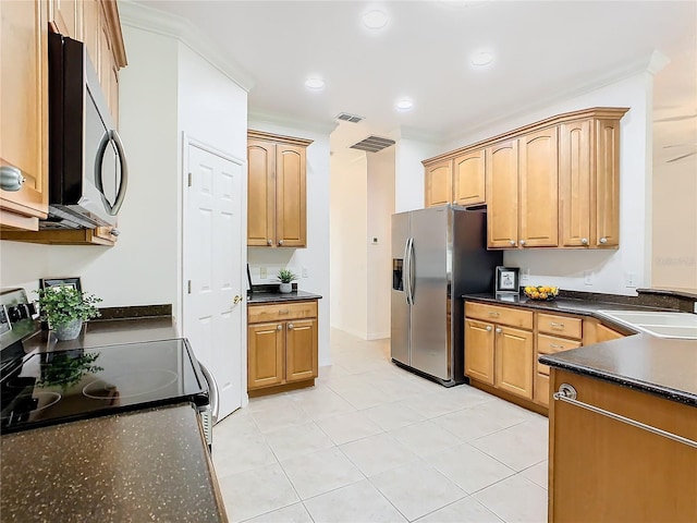 kitchen featuring appliances with stainless steel finishes, ornamental molding, sink, and light tile patterned floors