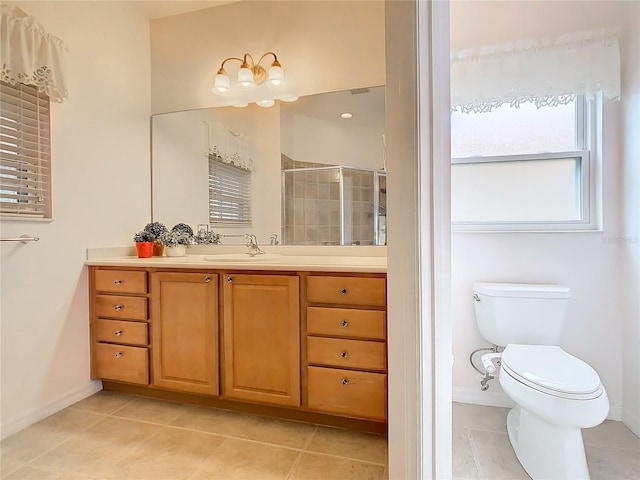 bathroom with walk in shower, tile patterned flooring, vanity, and toilet