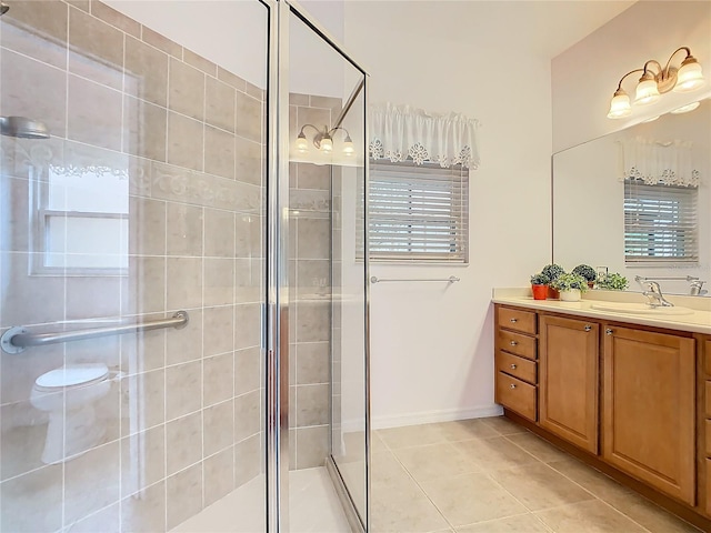 bathroom with tile patterned floors, walk in shower, vanity, and toilet