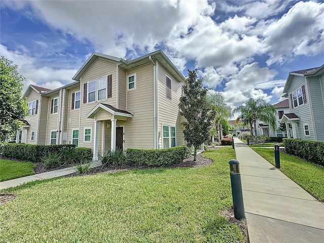 view of front of house with a front lawn