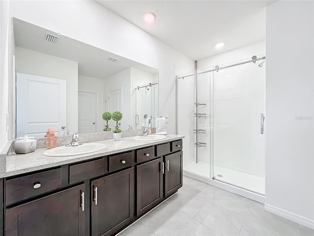 bathroom with vanity and walk in shower