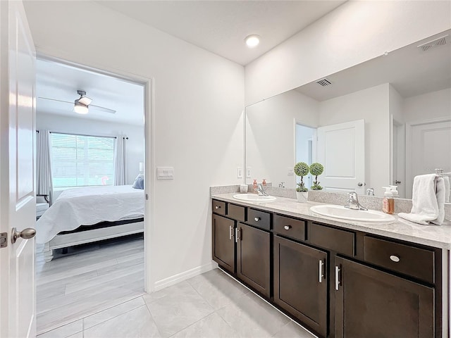 bathroom with vanity and ceiling fan