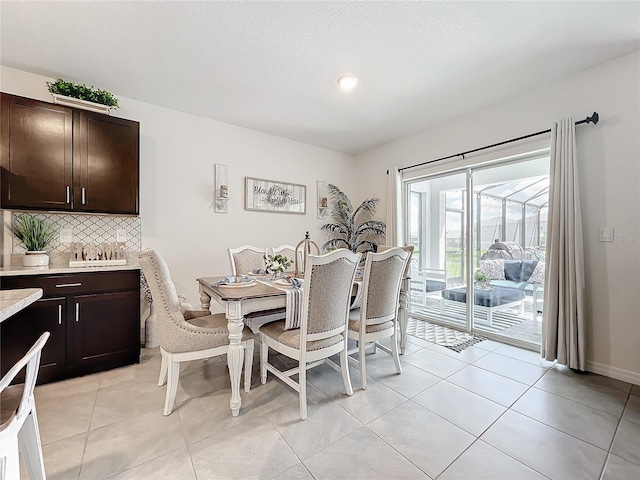 dining space with light tile patterned floors