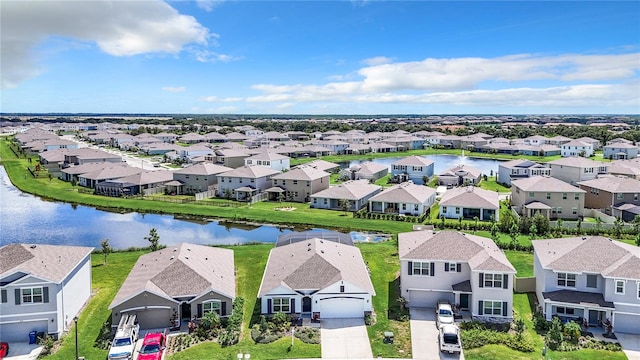 bird's eye view with a water view