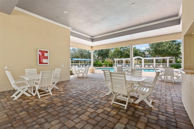 view of patio featuring a community pool