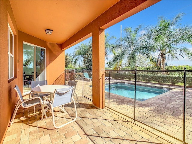 view of swimming pool featuring a patio area