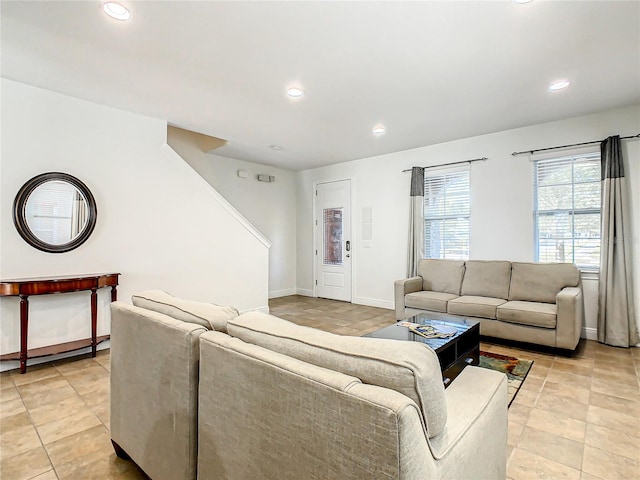 living room with light tile patterned floors