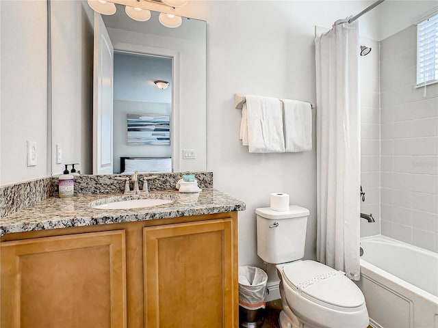 full bathroom featuring vanity, toilet, and shower / bath combo