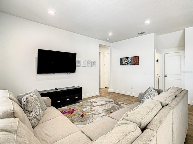 living room with hardwood / wood-style floors