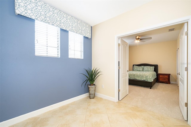 bedroom with light carpet