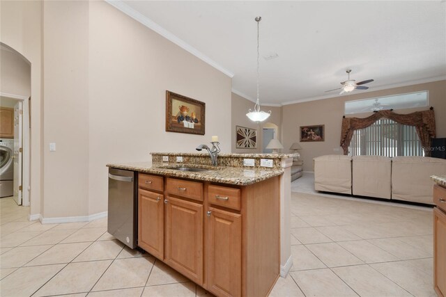 kitchen featuring decorative light fixtures, light stone counters, sink, ceiling fan, and stainless steel dishwasher