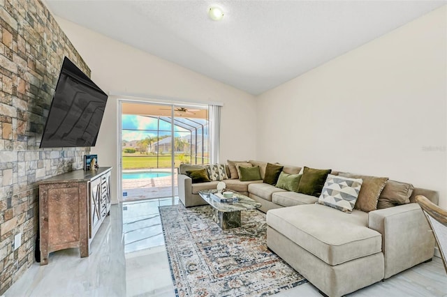 living room with lofted ceiling