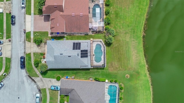 drone / aerial view featuring a water view