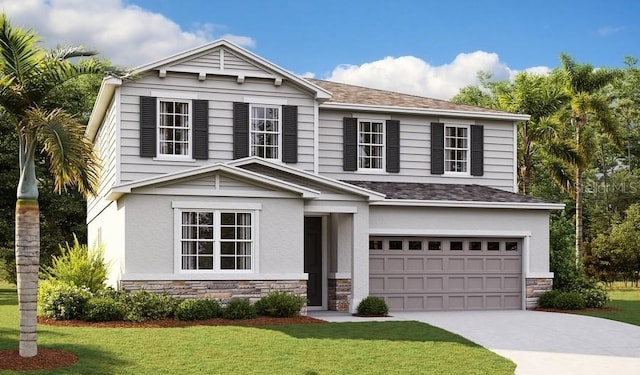 view of front facade with a front yard and a garage