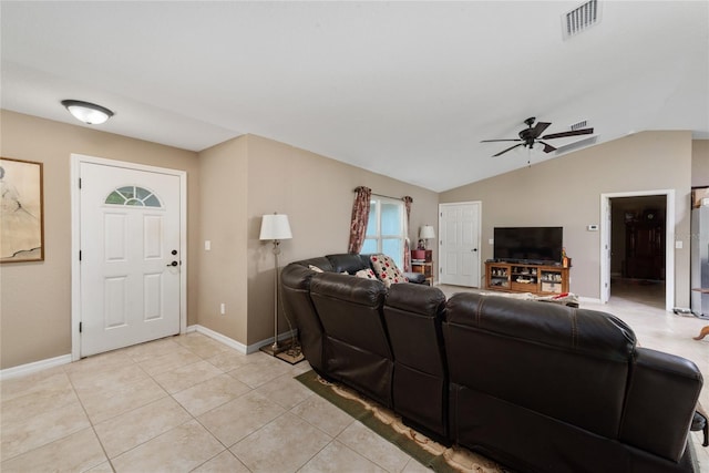 tiled living room featuring lofted ceiling and ceiling fan