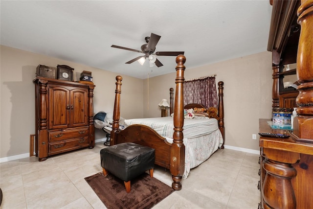 tiled bedroom with ceiling fan