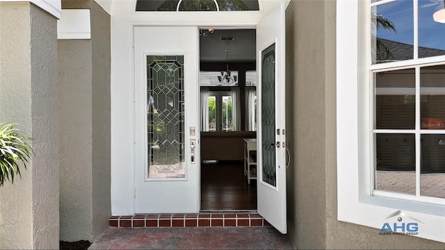 14421 Hatchee Ct, Orlando, FL 32837 - entrance to property with french doors and stucco siding