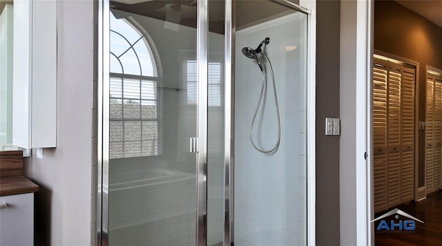 14421 Hatchee Ct, Orlando, FL 32837 - full bathroom with a ceiling fan and a shower stall