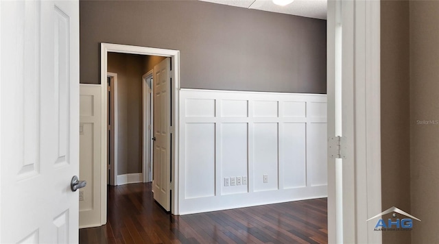 14421 Hatchee Ct, Orlando, FL 32837 - corridor featuring dark wood-type flooring