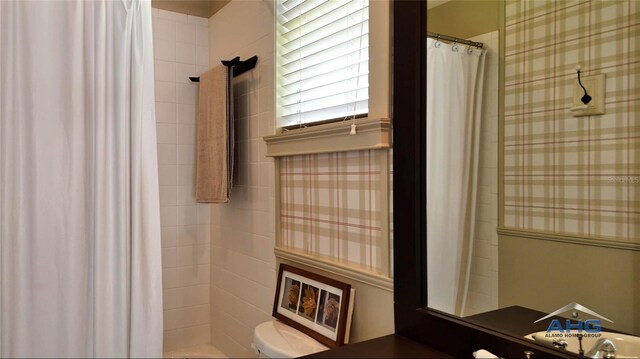 14421 Hatchee Ct, Orlando, FL 32837 - full bath featuring toilet and tiled shower
