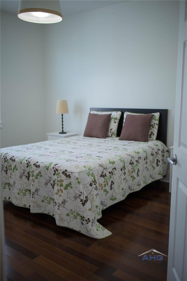 14421 Hatchee Ct, Orlando, FL 32837 - bedroom with wood-type flooring