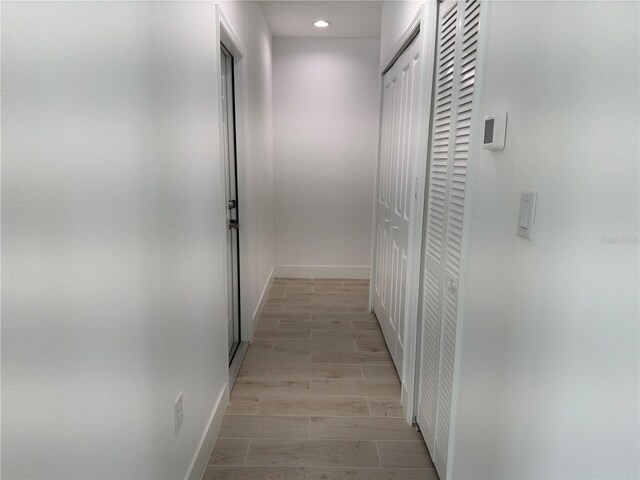 hallway featuring light hardwood / wood-style flooring