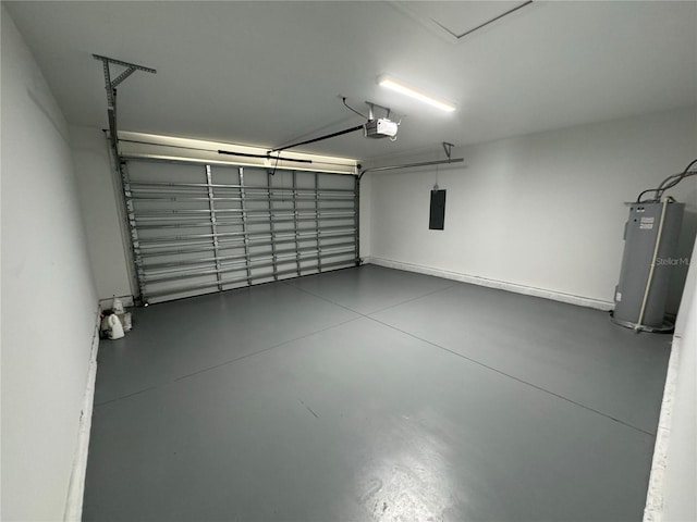 garage featuring gas water heater, electric panel, and a garage door opener