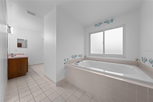 1775 Sundance Dr, Saint Cloud, FL 34771 - full bathroom featuring tile patterned floors, a garden tub, vanity, and baseboards