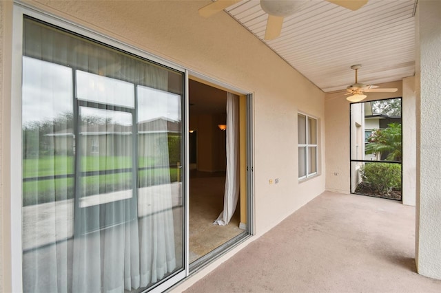 view of patio featuring ceiling fan