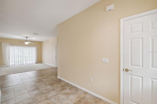 spare room featuring ceiling fan