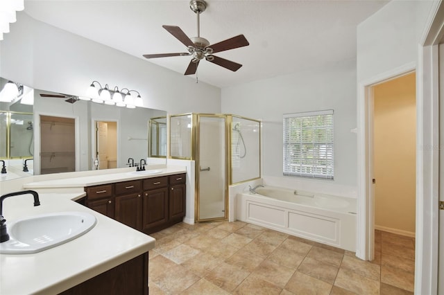 bathroom featuring ceiling fan, vanity, and plus walk in shower