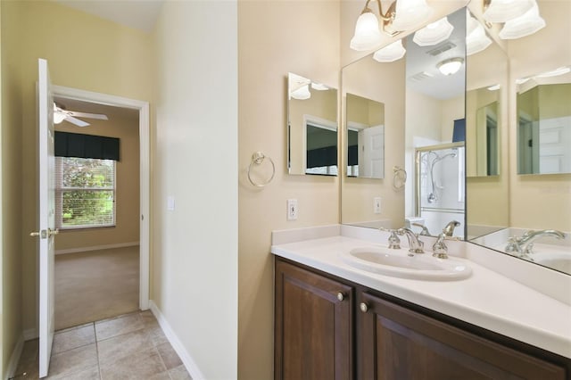 bathroom with vanity, ceiling fan, and tile patterned floors